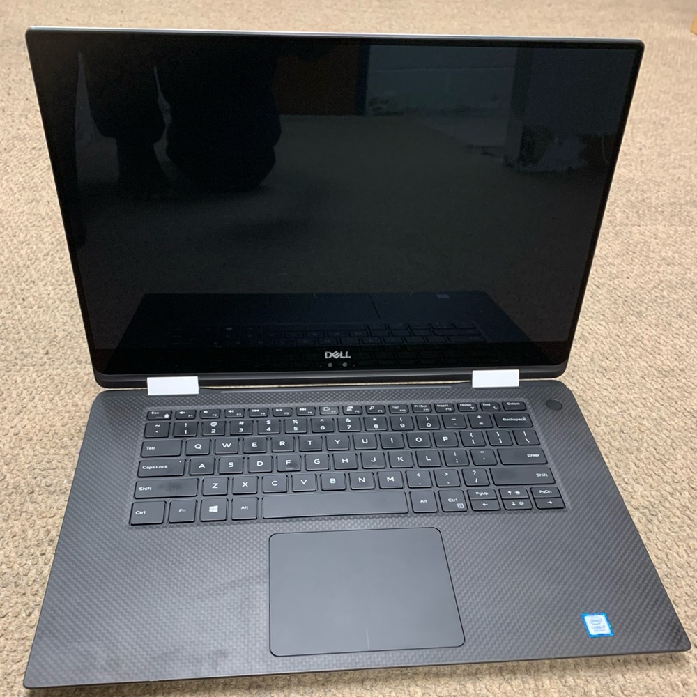Dell XPS 15 9575 2-in-1 Laptop. RAM size - 8 gig, SSD capa - 256, FHD, touchscre
